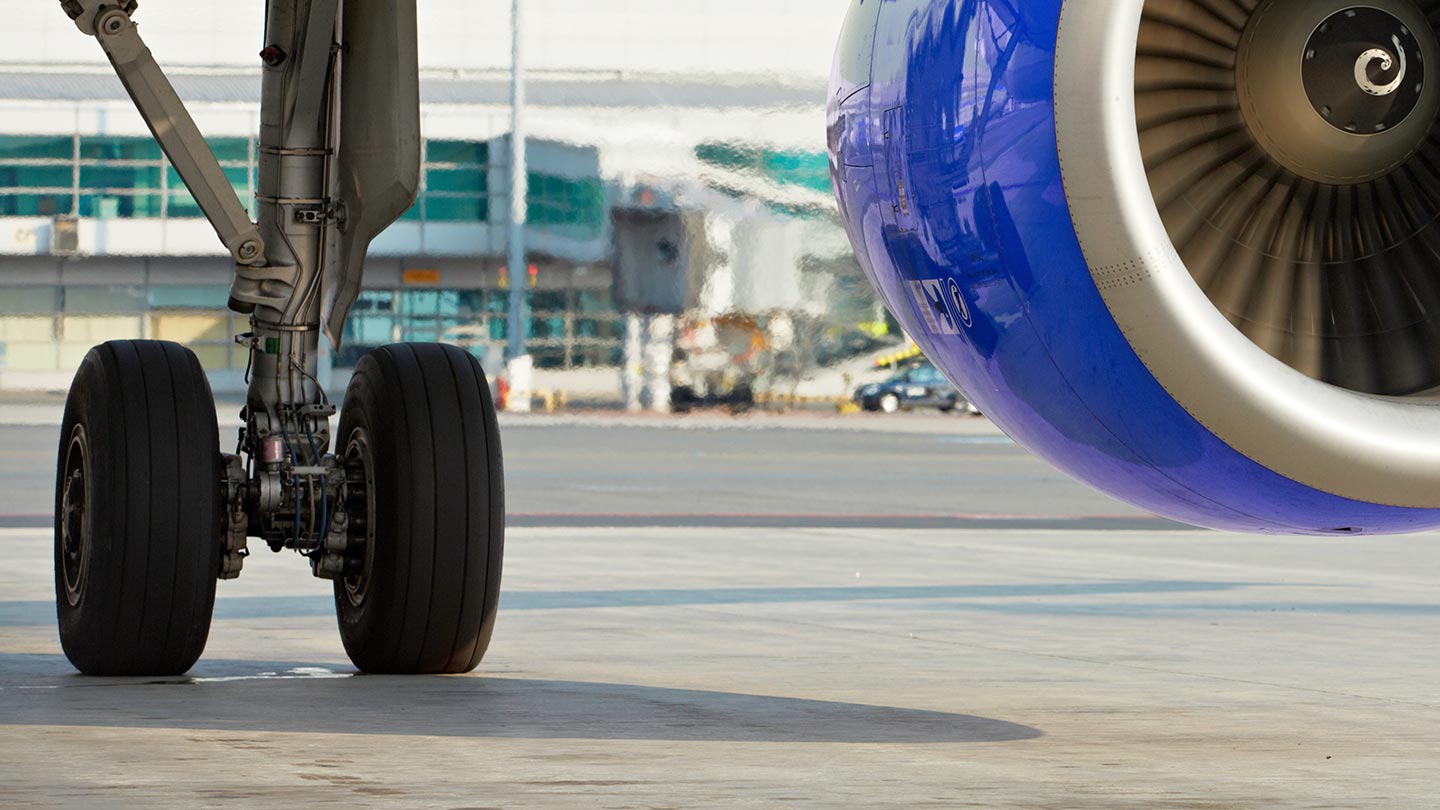 Photo aircraft on runway - concept: Aircrafters airplane wheels and brakes